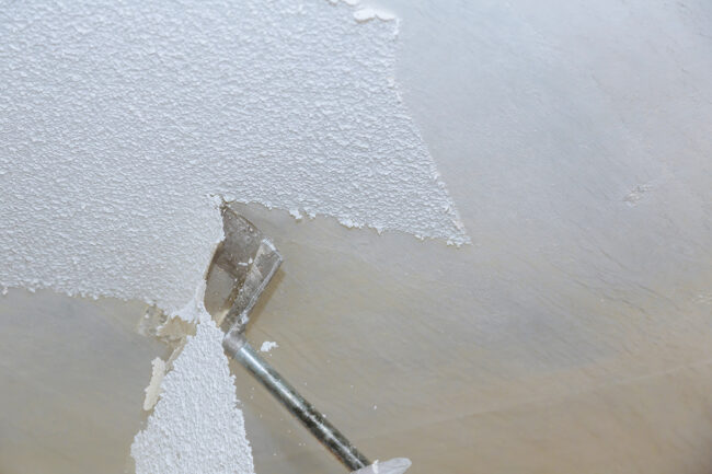Removal old popcorn ceiling wall background
